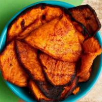 Charred Sweet Potato · Farm fresh sweet potato slices cooked on our famous grill.  Want 'em sweeter?  Add cinnamon ...