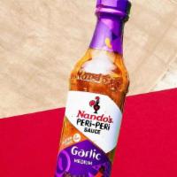 Bottle Sauce Garlic · Garlic is many things, but it isn't subtle.  Just like this sauce, a blend of PERi-PERi with...