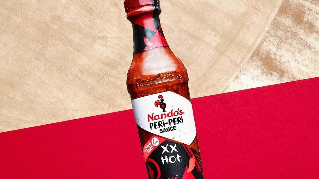Bottle Sauce Xx Hot · We salute you.  With eyes streaming and mouth burning, you'll fall for fire that doesn't flinch from flavor.  Balanced with PERi-PERi, lemon, garlic, onion and spices, you will be coming back for more.