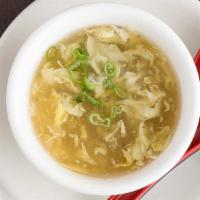 Egg Drop Soup · Chicken broth with egg flakes and scallion.