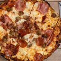 Four Meat · Canadian bacon, sausage, pepperoni, smokehouse bacon.