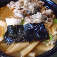 Beef Ramen (Spicy) · Black garlic oil in soy sauce base with sliced beef, boiled egg, bamboo shoots, enoki mushro...