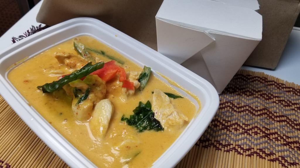 Panang · Contains peanut. Minced red curry, coconut milk, and kaffir lime leaves, simmered to perfection.