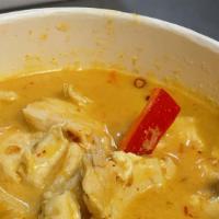Yellow Curry · Minced karee curry, coconut milk, potato, and onion, simmered till perfect.
