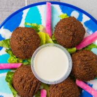 Falafel · Freshly fried balls of mixed fava and chickpeas with an assortment of other spices and ingre...