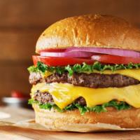 Double Cheeseburger · Two juicy beef patties topped with melted cheese, lettuce and tomatoes layered between buns....