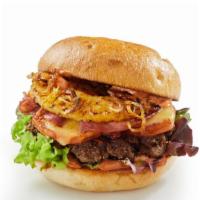 Hawaiian Burger · Juicy half pound beef patty topped with grilled pineapple, slice of ham, Swiss or mozzarella...
