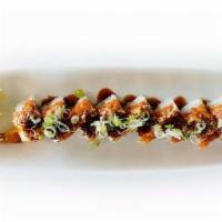 Bonfire Roll · Shrimp tempura roll topped with spicy salmon, torched with kewpie mayo and spicy blend. Garn...