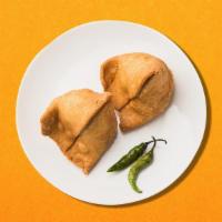 Crispy Fried Pastry · Crisp and spicy deep fried snack with a crisp and flaky outer layer and a rich filling of ma...