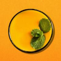 Mango Yogurt Smoothie · A thick smoothie made with fresh churned mango flavored yogurt beverage