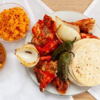 Whole Chicken (2-3 People) · includes: 8oz rice, 8oz charro beans, tortillas and salsa. Grilled onion on request