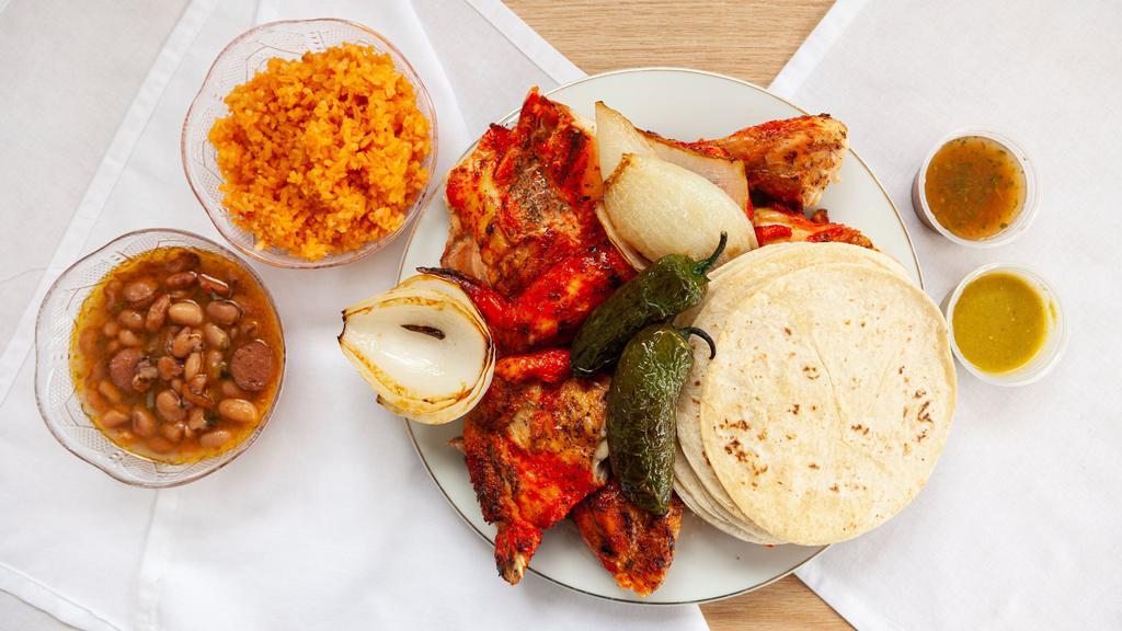 Whole Chicken (2-3 People) · includes: 8oz rice, 8oz charro beans, tortillas and salsa. Grilled onion on request