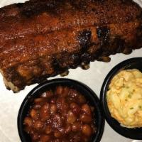 Half Slab · Seasoned with custom dry rub and smoked slowly to perfection. served wet or dry with your ch...