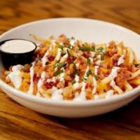 Cheese & Bacon Fries · Cheddar, bacon, sour cream, chives