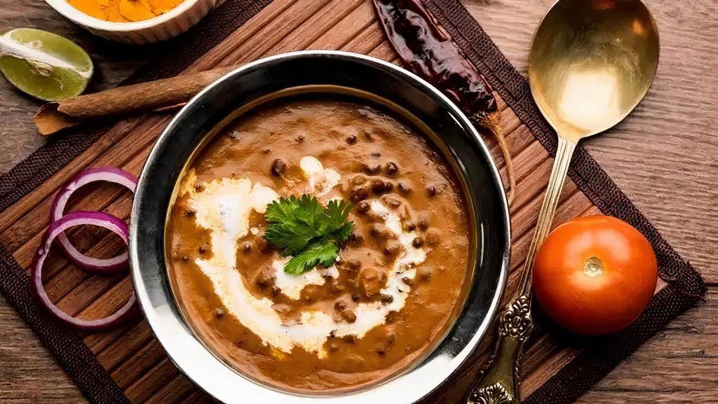Dal Makhani · Black Lentils Prepared in Light Cream and Touch of Butter and Garnished with
tomatoes, onions and Ginger.