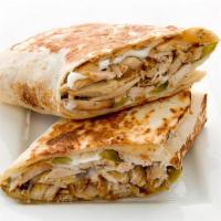 Chicken Shawarma · Thin sliced seasoned tender chicken served with  tomatoes, pickles and garlic sauce.