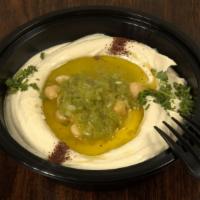 Hummus · Chickpeas, blended with tahini house spices, olive oil and lemon juice garnished with sumac ...