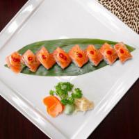 Sakura Special Roll · Tuna, salmon, yellow tail, shrimp tempura, eel, crab, cucumber, avocado and masago.