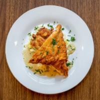 Clingy Chick · Buttermilk Fried Chicken Breast, Country Bourbon Gravy, Smashed Yukon Gold  and Sauteed Gree...