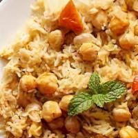 Rice - Channa · Includes 12 oz each of Channa Masala and Rice.
Served with onions, Indian mix pickle and min...