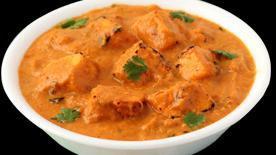 Paneer Tikka Masala · Marinated cheese served in a spicy gravy
