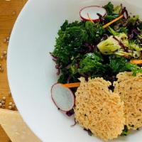 Kale-Quinoa Salad · Parmesan crisps, shredded carrots, red cabbage, roasted broccoli, red radishes. Dressing cho...