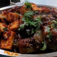Paneer Chilli · Homemade cheese cubes fried and prepared with green peppers and onions in Indo-chinese sauce.
