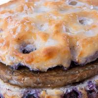 Sweet Country Blues · Cooper River Farms all-natural and clean label pork sausage on a glazed blueberry biscuit.