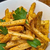Italian Fries · We take our crispy house fries, toss them in Italian herbs and spices, and serve them with a...