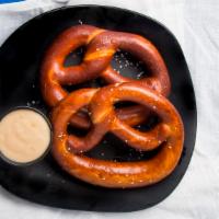 Point Bavarian Pretzels · 2 large, locally baked pretzels served with point beer cheese dip and mustard.