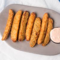 Point Fried Pickles · Our spears are lightly coated in seasoned panko bread crumbs and served with hangover sauce.