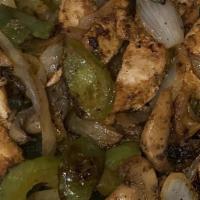 Fajitas Combo · Steak and chicken grilled with onions, tomatoes, green peppers, and poblano peppers.