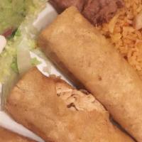 Flautas (3) · A deep-fried corn tortilla filled with choice of beef or chicken. Served with sour cream and...