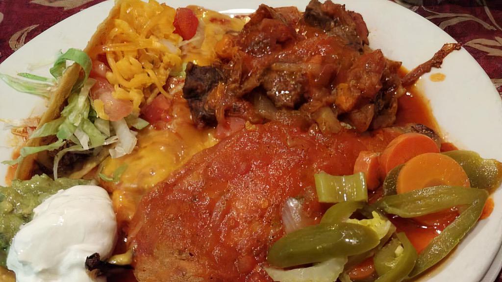 Campana Plate Combo · One chicken enchilada, one crispy beef taco, one beef chile relleno and bistek a la Mexicana.