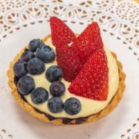 Fruit Tart · Buttery tart shell with a chocolate coating, filled with Bavarian cream and topped with a va...