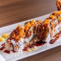 Spider Roll · Raw, shellfish. Deep-fried soft shell crab, crab salad, cucumber avocado, topped with tempur...