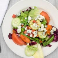 Insalata All Francesca · romaine, endive, and radicchio with peapods, green beans, carrots, tomatoes, and cucumbers w...