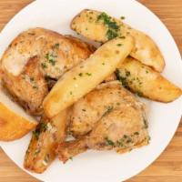 Pollo Arrosto Alla Romana · roasted half chicken with garlic, shallots, rosemary,
lemon, and olive oil, served with roas...