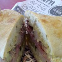 #1 The Cuban · Slow roasted pork, black forest ham, garlic dill pickles, swiss cheese, spicy mustard, and m...
