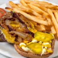 Bacon Cheeseburger · Hearty Angus beef patty with cheese and crispy bacon on toasted buns and SERVED WITH FRENCH ...