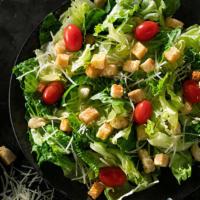 Caesar Salad · Lettuce, tomatoes, shredded parmesan & croutons.