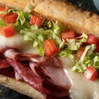 Italian Classic Sub · 8 inch. Ham, salami, provolone, lettuce & tomatoes. Served with a side of Italian dressing