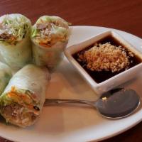 Spring Rolls · Shrimp, ground pork or Tofu with fresh lettuce, carrot, cilantro, and rice noodles wrapped i...
