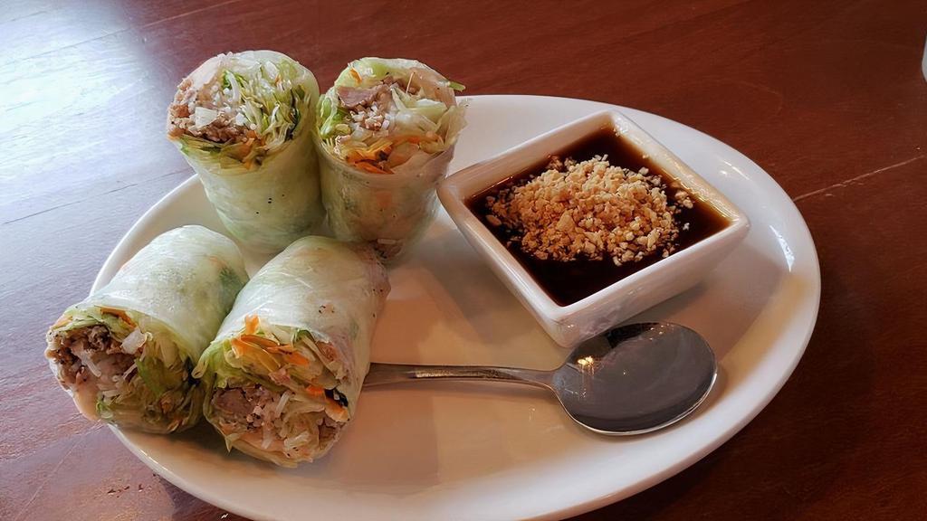Spring Rolls · Shrimp, ground pork or Tofu with fresh lettuce, carrot, cilantro, and rice noodles wrapped in rice paper.