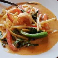 Red Curry · Gluten-Free. Your choice of meat served in mild red curry with coconut milk, bell pepper, ba...