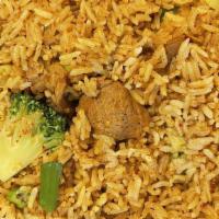 Curry Fried Rice · Gluten-Free. Thai fried rice with unique yellow curry powder, egg, carrot, peas, and green o...