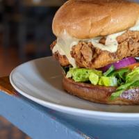 Yard Bird · Perfectly crispy fried chicken, melted sharp cheddar, lettuce, seasoned tomato, onion, and m...