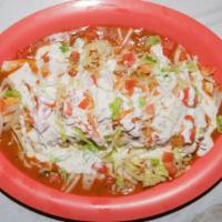 Macho Burrito · Stuffed with your choice of meat, topped with homemade tomato-based sauce, cheese, lettuce, ...