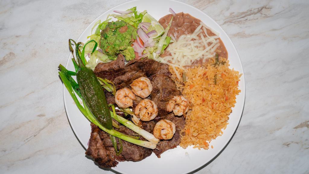 Pancho Villa · steak served with rice and beans shrimp
 lettuce guacamole fried jalapenos & spring onions.