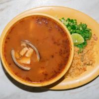 Caldo De Siete Mares · Seven seas soup includes clam, catfish, shrimp, and squid.